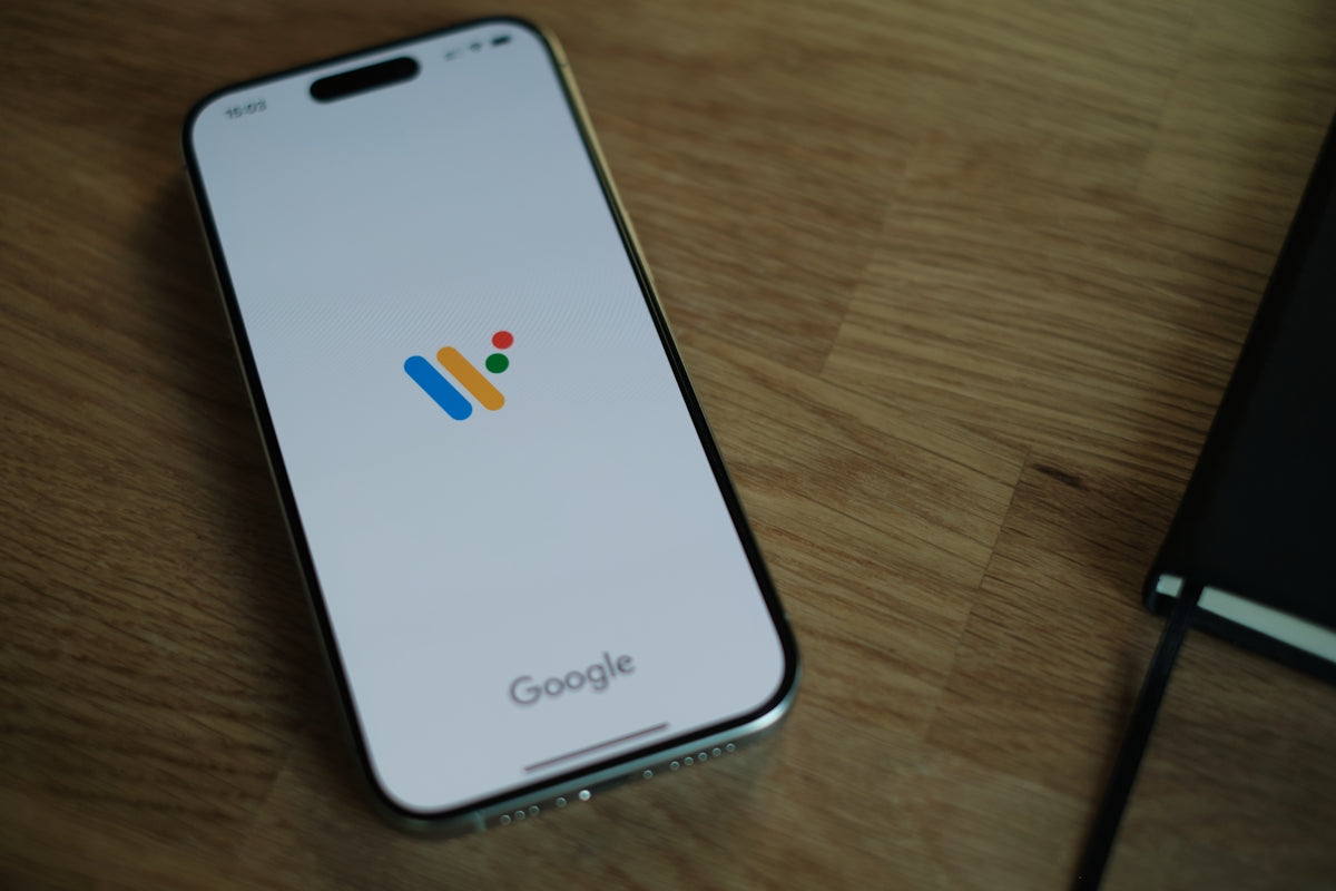 A close up of a cell phone on a table