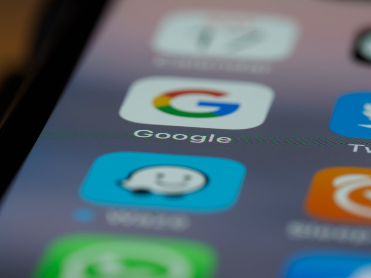 black smartphone showing icons with icons